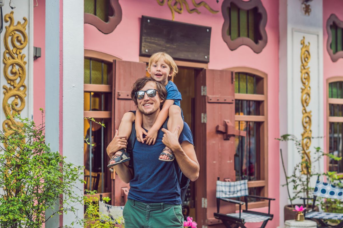 A dad and son exploring Phuket old town