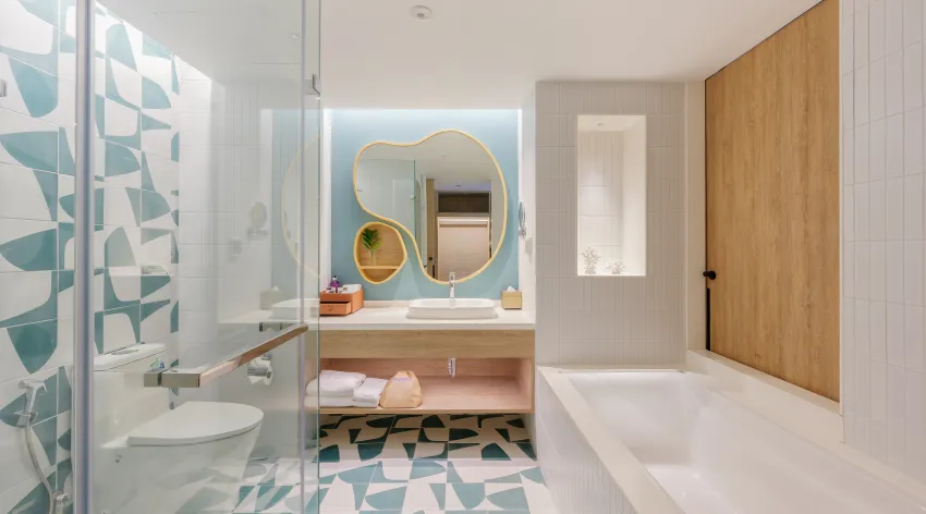 The spacious bathroom with a bathtub inside Premium Deluxe Pool-View room