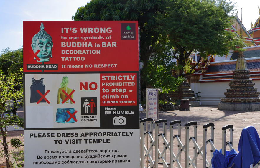 A signboard showing Thailand temple dress code 